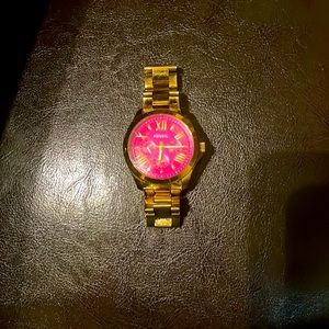 Hot pink Fossil Large face watch.